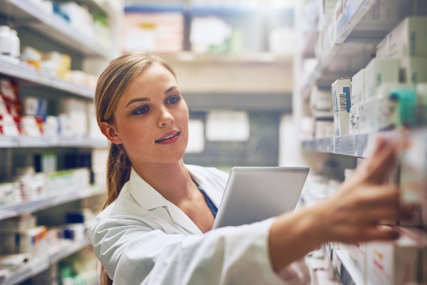 image of pharmacist picking a prescription